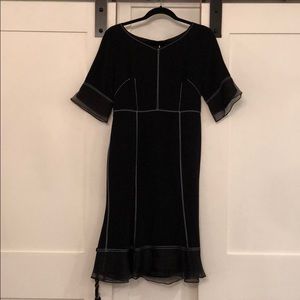 Black dress with white stitching
